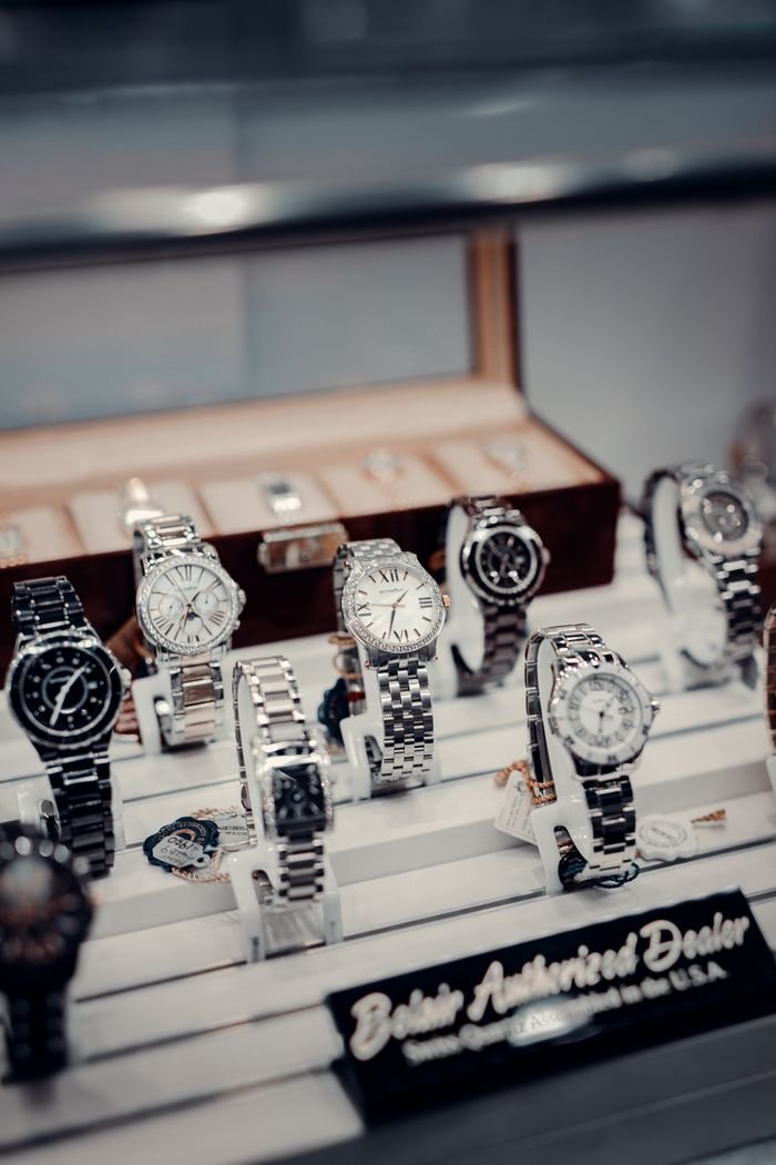 faq-img A stylish display of luxury wristwatches at a boutique authorized dealer.