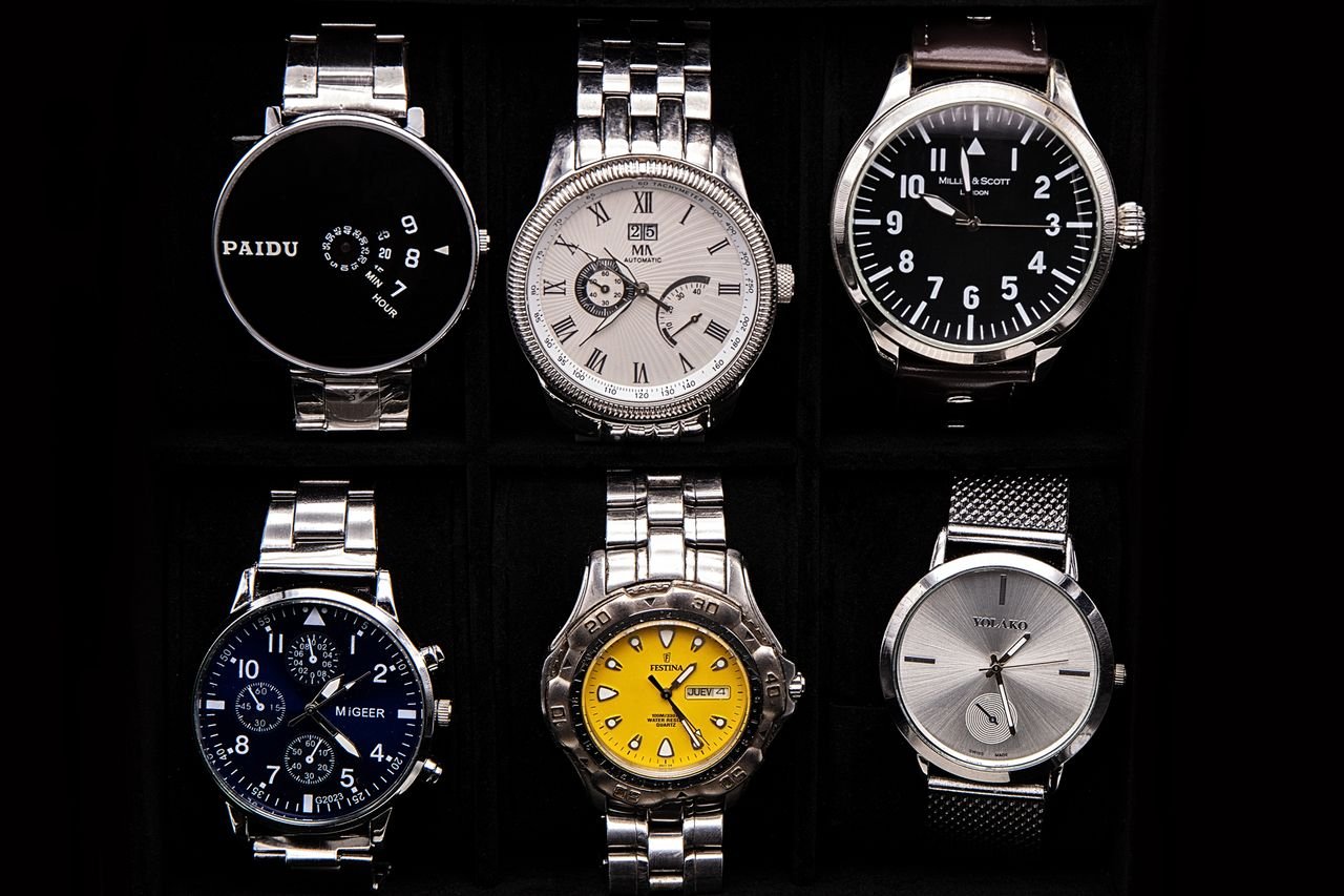 our-story-02 A variety of sophisticated wristwatches displayed against a dark background.